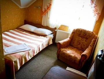 Фото номера Стандартный семейный номер Мотели Motel Kurortnyy &amp; SPA г. Шкло 4