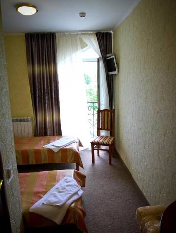 Фото номера Двухместный номер с 2 отдельными кроватями и окном Мотели Motel Kurortnyy &amp; SPA г. Шкло 3