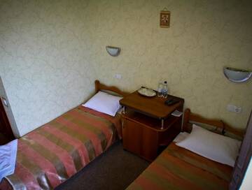 Фото номера Двухместный номер с 2 отдельными кроватями и окном Мотели Motel Kurortnyy &amp; SPA г. Шкло 4